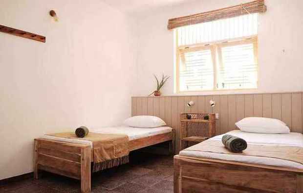 Twin room with two teak beds
