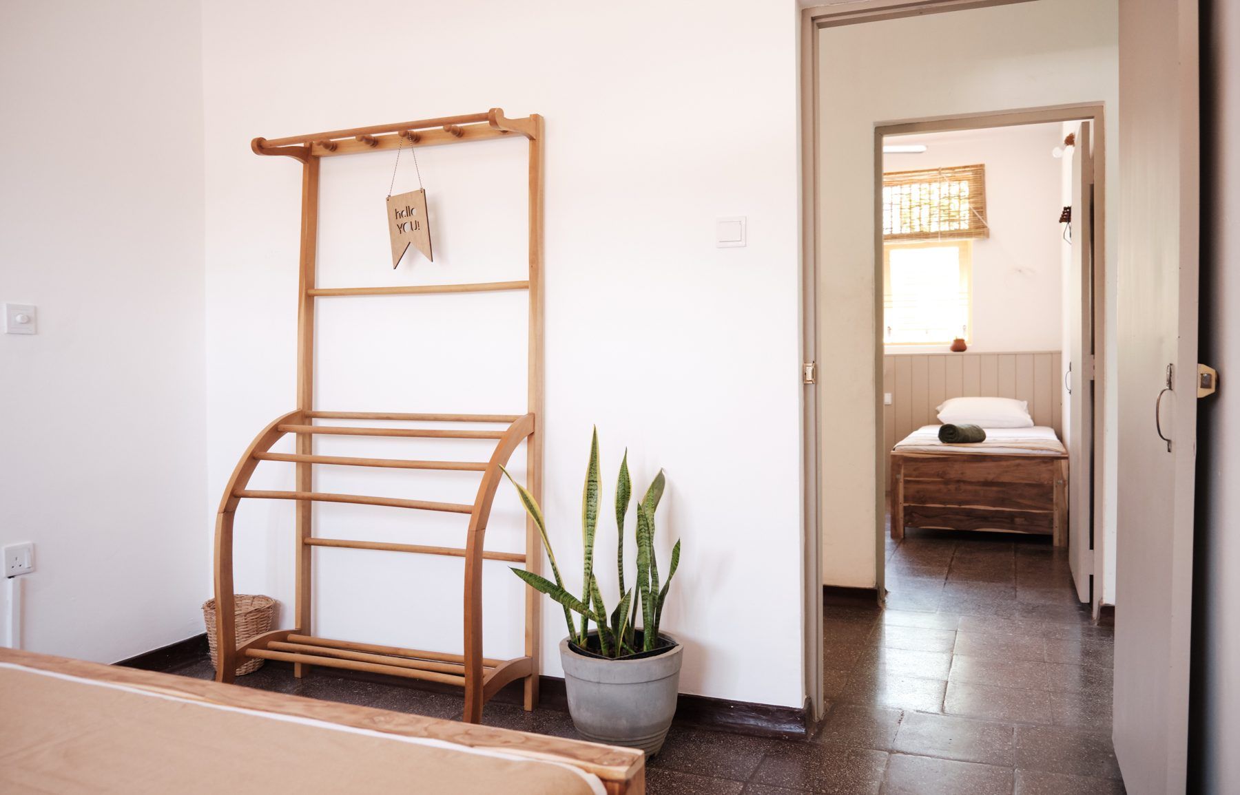 Rack and doorway to the room beyond