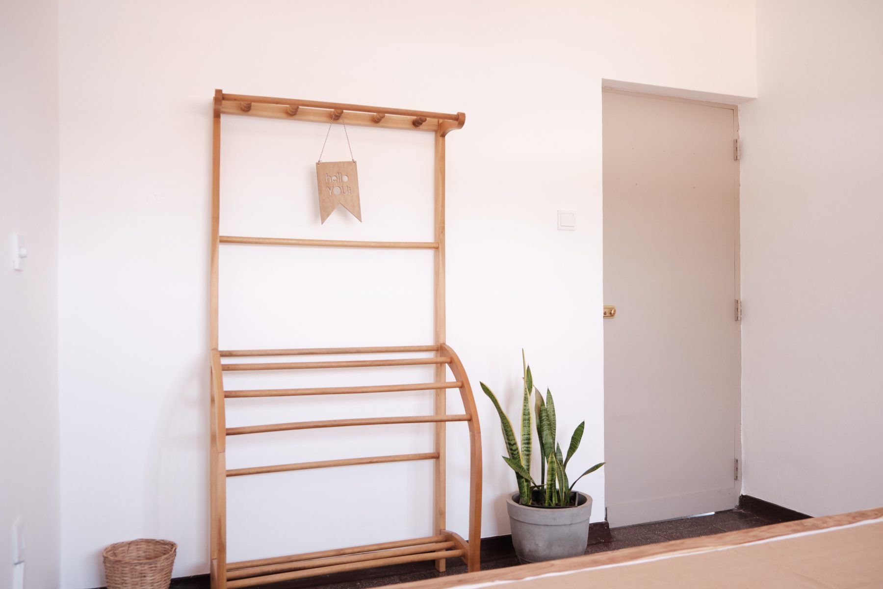 Wall rack with hello sign